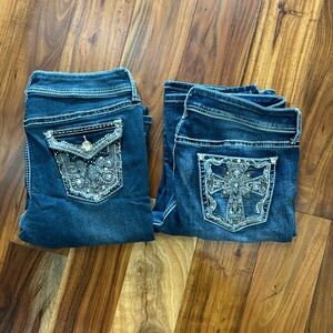 2 pairs of APT 9 boot cut jeans.
